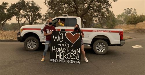 we love our hometown heroes sign